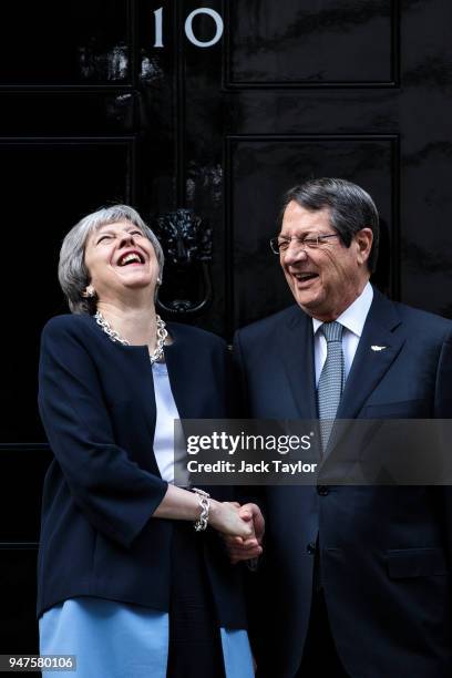British Prime Minister Theresa May greets the Cypriot President Nicos Anastasiades outside Number 10 Downing Street ahead of a bilateral meeting on...