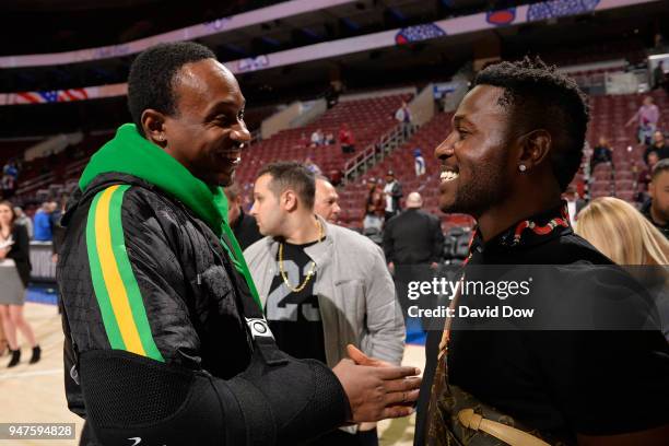 Alshon Jeffery and Antonio Brown attend the game between the Miami Heat and the Philadelphia 76ers in Game Two of Round One of the 2018 NBA Playoffs...