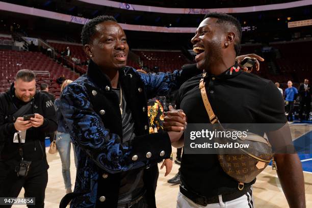 Michael Blackson and Antonio Brown attend the game between the Miami Heat and the Philadelphia 76ers in Game Two of Round One of the 2018 NBA...