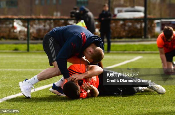 Limerick , Ireland - 17 April 2018; Keith Earls and Conor Murray wrestle during Munster Rugby squad training at the University of Limerick in...