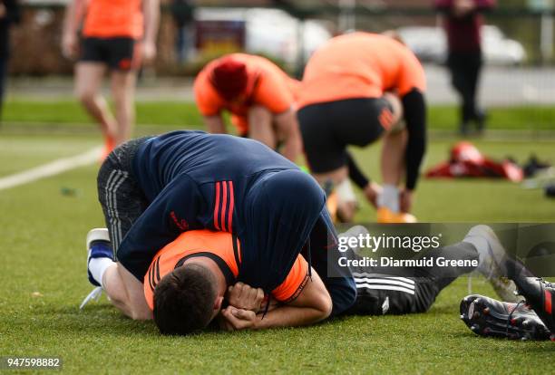 Limerick , Ireland - 17 April 2018; Keith Earls and Conor Murray wrestle during Munster Rugby squad training at the University of Limerick in...