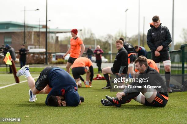 Limerick , Ireland - 17 April 2018; Keith Earls and Conor Murray wrestle as Peter O'Mahony looks on during Munster Rugby squad training at the...