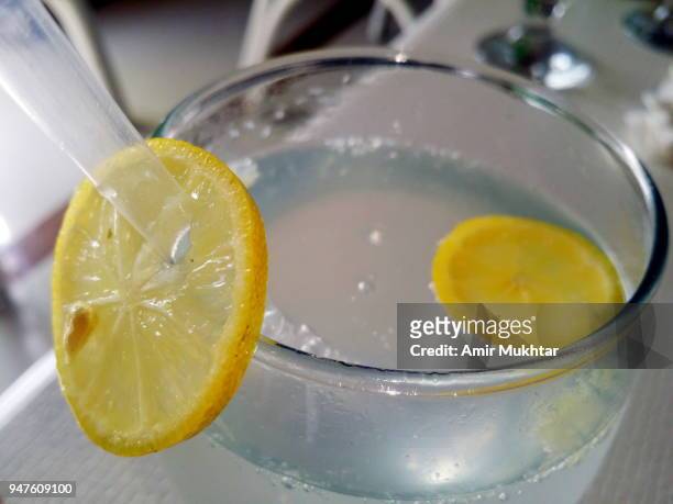 fresh lime (lemonade) drink in a glass with lemon slices - lemon juice stock pictures, royalty-free photos & images