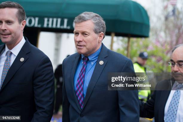 From left, Reps. Rodney Davis, R-Ill., Charlie Dent, R-Pa., and Bruce Poliquin, R-Maine, leave a meeting of the GOP Conference at the Capitol Hill...