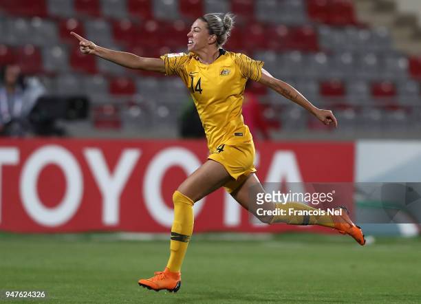 Alanna Kennedy of Australia celebrates winning the AFC Women's Asian Cup semi final between Australia and Thailand after a penalty shoot out at the...