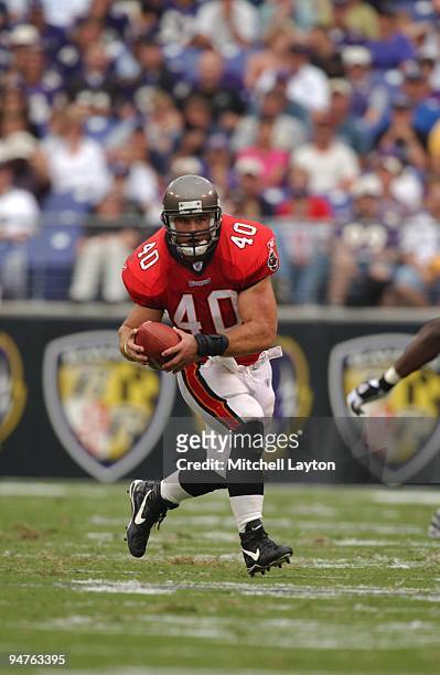 Mike Alstott of the Tampa Bay Buccaneers runs with the ball during a NFL football game against the Baltimore Ravens on September 15, 2002 at PSINet...