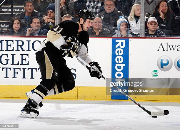 Jordan Staal of the Pittsburgh Penguins controls the puck against the Philadelphia Flyers on December 15, 2009 at Mellon Arena in Pittsburgh,...
