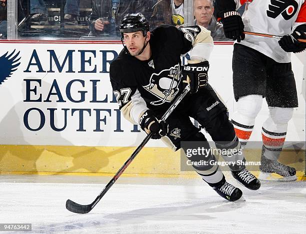 Craig Adams of the Pittsburgh Penguins skates against the Philadelphia Flyers on December 15, 2009 at Mellon Arena in Pittsburgh, Pennsylvania.