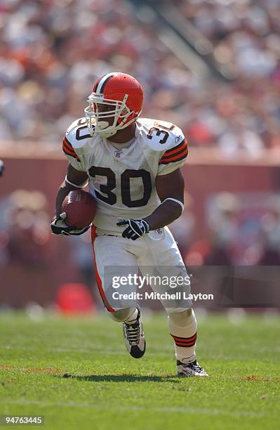 Jamel White of the Cleveland Browns runs with the ball during a NFL football game against the Kansas City Chiefs on September 8, 2002 at Cleveland...