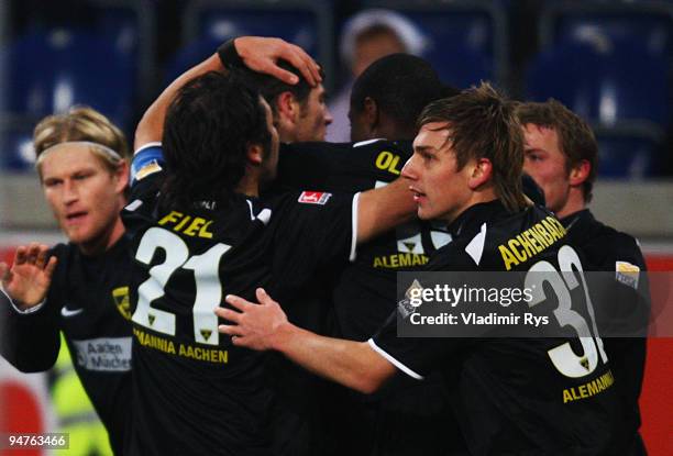 Babacar Gueye of Aachen is celebrated by his team mates after scoring his team's first goal during the Second Bundesliga match between MSV Duisburg...