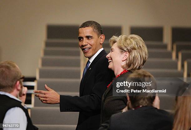 President Barack Obama walks with Secretary of State Hillary Clinton at the Bella Centre on the final day of the UN Climate Change Conference on...