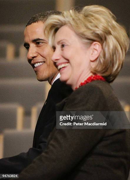 President Barack Obama walks with Secretary of State Hillary Clinton at the Bella Centre on the final day of the UN Climate Change Conference on...