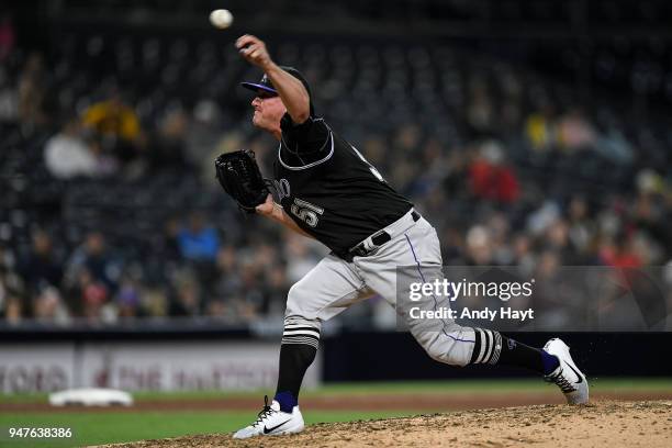 Jake McGee of the Colorado Rockies pitches during the game against the San Diego Padres at PETCO Park on April 2, 2018 in San Diego, California. Jake...