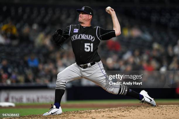 Jake McGee of the Colorado Rockies pitches during the game against the San Diego Padres at PETCO Park on April 2, 2018 in San Diego, California. Jake...