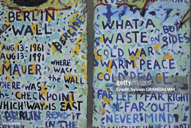 Germany,Berlin,grafittis on a Berlin wall piece.