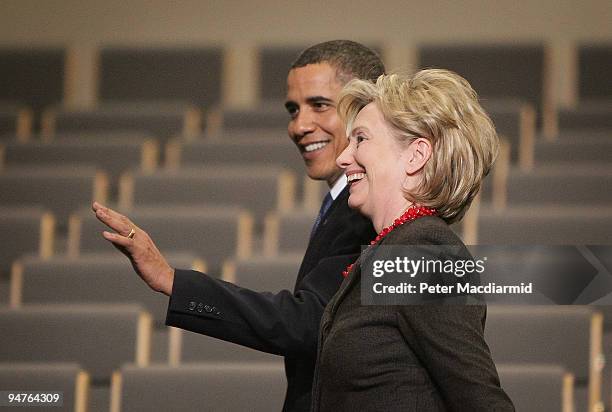 President Barack Obama walks with Secretary of State Hillary Clinton on at the Bella Centre on the final day of the UN Climate Change Conference on...