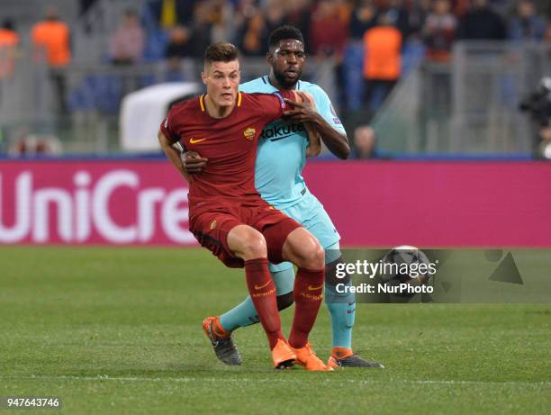 Patrik Schick and Samuel Umtiti during the UEFA Champions League quarter final match between AS Roma and FC Barcelona at the Olympic stadium on April...