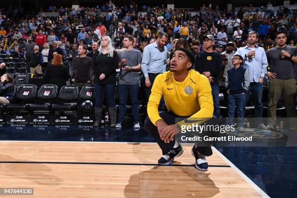 Gary Harris of the Denver Nuggets looks on from the floor before the game against the Portland Trail Blazers on APRIL 9, 2018 at the Pepsi Center in...