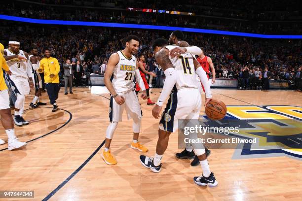 Jamal Murray of the Denver Nuggets and Gary Harris celebrate after the game against the Portland Trail Blazers on APRIL 9, 2018 at the Pepsi Center...