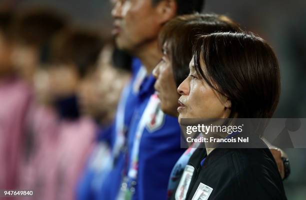 Head coach of Japan, Asako Takemoto looks on during national anthem prior to the AFC Women's Asian Cup semi final match between China and Japan at...