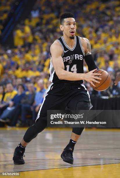 Danny Green of the San Antonio Spurs drives towards the basket against the Golden State Warriors in the first quarter during Game One of the first...
