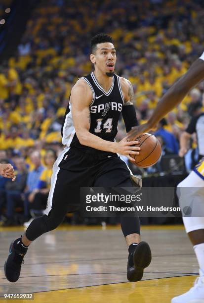 Danny Green of the San Antonio Spurs drives towards the basket against the Golden State Warriors in the first quarter during Game One of the first...
