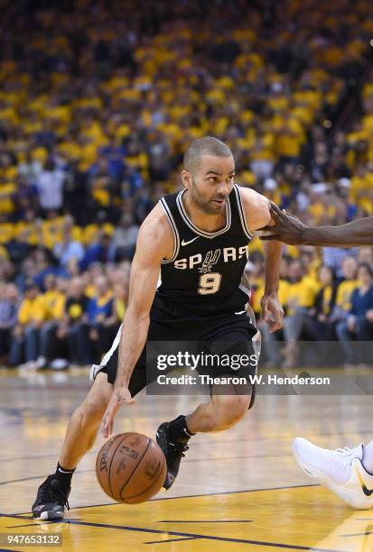 Tony Parker of the San Antonio Spurs looks to drive towards the basket against the Golden State Warriors in the second quarter during Game One of the...