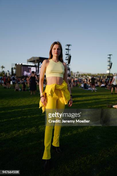 Coachella guest wearing all over a yellow outfit during day 1 of the 2018 Coachella Valley Music & Arts Festival Weekend 1 on April 13, 2018 in...