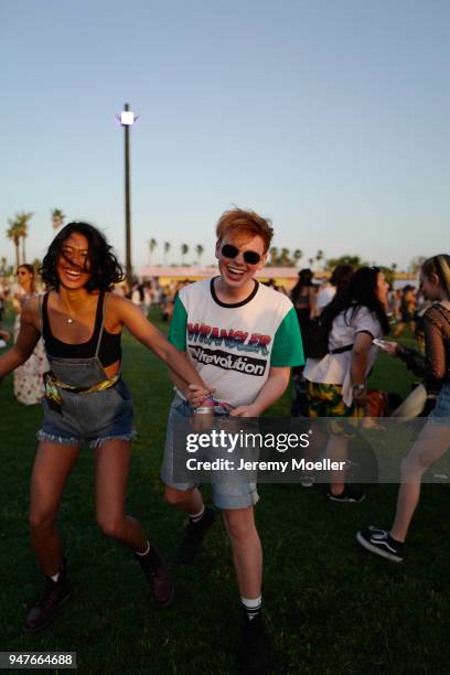 Anuthida Ploypetch and Erik Scholz wearing a Wrangler Short and T-Shirt during day 1 of the 2018 Coachella Valley Music & Arts Festival Weekend 1 on...