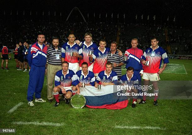 Russia pose with the Rugby World Cup 7's plate during the Rugby World Cup 7's held at Mar Del Plata, in Argentina. \ Mandatory Credit: Dave Rogers...