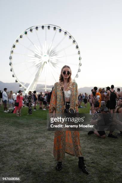 Leonie Hanne wearing Chloe boots and bag, Spell & the Gypsy dress during day 1 of the 2018 Coachella Valley Music & Arts Festival Weekend 1 on April...