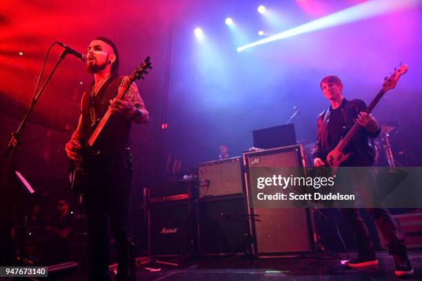 Musicians Dave Navarro and Chris Chaney of the band Jane's Addiction performs onstage during the Above Ground concert benefiting MusiCares at Belasco...