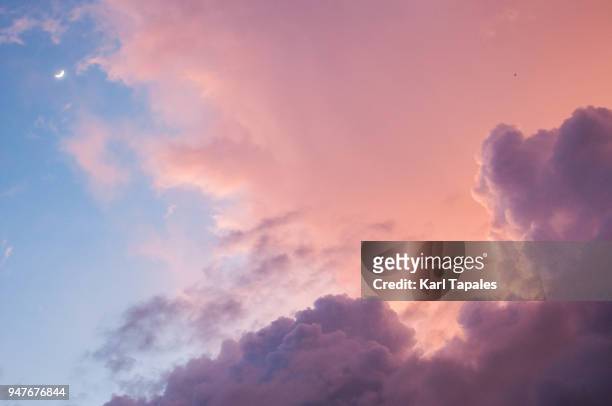 a beautiful cloudscape of red and blue sky - pink sky stock pictures, royalty-free photos & images