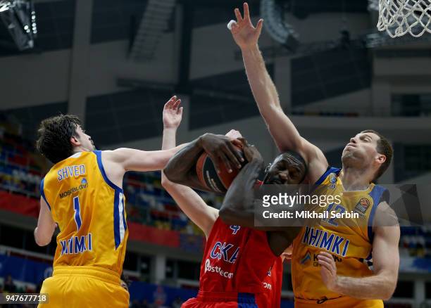 Othello Hunter, #44 of CSKA Moscow competes with Sergey Monia, #12 and Alexey Shved, #1 of Khimki Moscow Region in action during the Turkish Airlines...