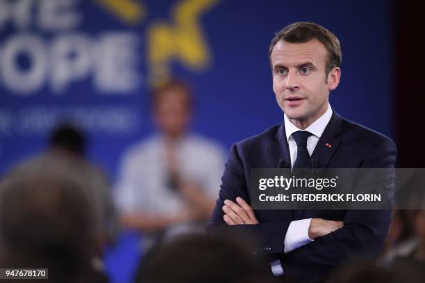 French president Emmanuel Macron ponders as he speaks during the opening of a series of citizen's consultation meetings on Europe on April 17, 2018...