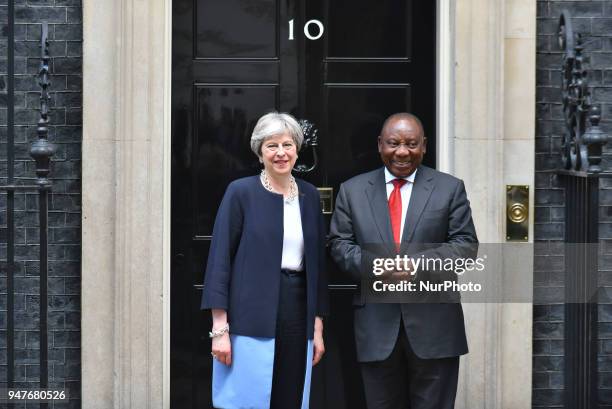 Britain's Prime Minister Theresa May greets South Africa's President Cyril Ramaphosa at 10 Downing Street in central London, prior to bilateral talks...