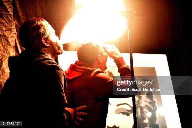 Comedian Steve-O of the TV show Jackass lights his hair on fire onstage during the Above Ground concert benefiting MusiCares at Belasco Theatre on...