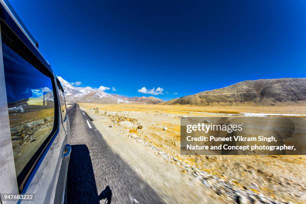 road trip to mountains - snow border stock pictures, royalty-free photos & images