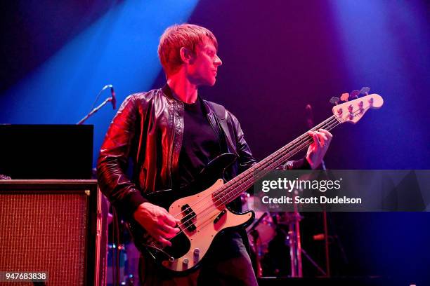 Bass player Chris Chaney of the band Jane's Addiction performs onstage during the Above Ground concert benefiting MusiCares at Belasco Theatre on...