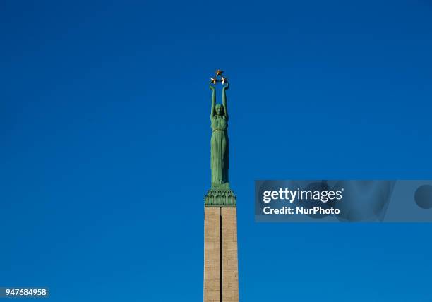 Freedom monument memorial in Riga, Latvia in the blue sky. The monument is honoring the soldiers killed during the Latvian War of Independence...