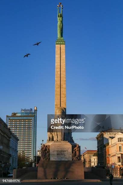 Freedom monument memorial in Riga, Latvia in the blue sky. The monument is honoring the soldiers killed during the Latvian War of Independence...