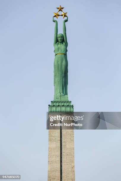 Freedom monument memorial in Riga, Latvia in the blue sky. The monument is honoring the soldiers killed during the Latvian War of Independence...