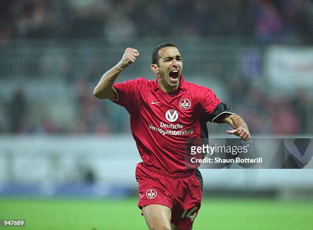 Youri Djorkaeff of Kaiserslautern celebrates giving his side an early lead and glimmer of hope during the UEFA Cup Semi-Final second leg match...