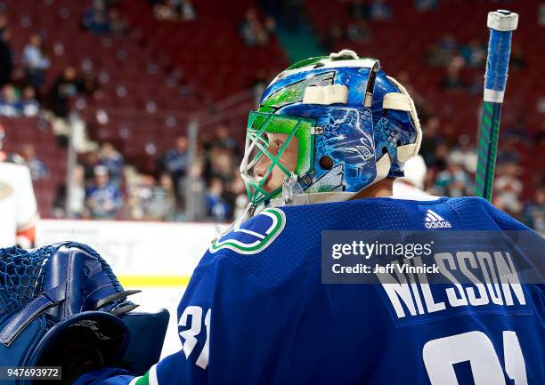 Anders Nilsson of the Vancouver Canucks looks on from the bench during their NHL game against the Anaheim Ducks at Rogers Arena March 27, 2018 in...