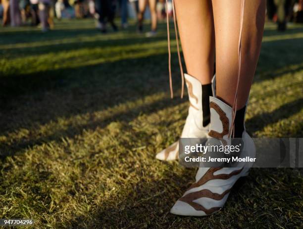 Lisa Hahnbueck wearing Louis Vuitton Boots bag during day 2 of the 2018 Coachella Valley Music & Arts Festival Weekend 1 on April 14, 2018 in Indio,...