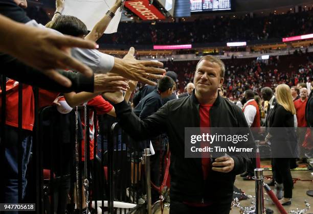 Houston Rockets owner Tilman Fertitta greets fans after Game One of the first round of the 2018 NBA Playoffs against the Minnesota Timberwolves at...