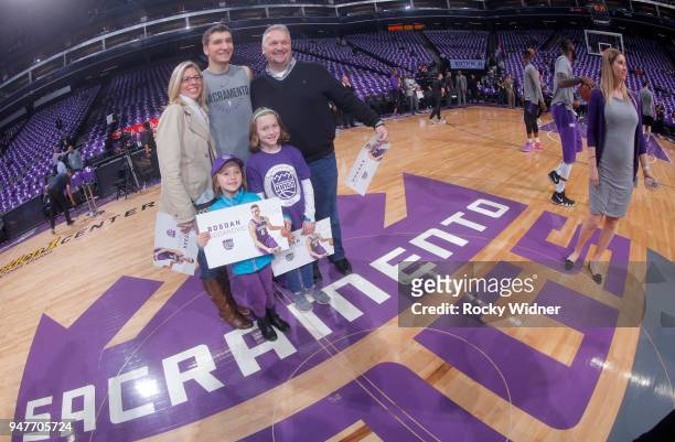 Bogdan Bogdanovic of the Sacramento Kings poses for a photo with fans prior to the game against the Houston Rockets on April 11, 2018 at Golden 1...