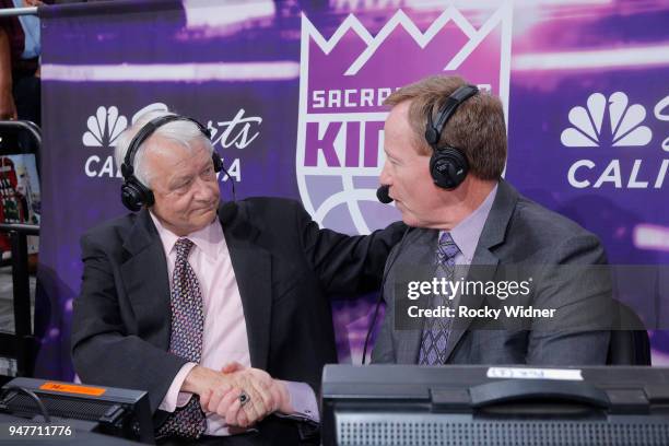 Sacramento Kings TV analyst Jerry Reynolds shakes hands with announcer Grant Napear during to the game against the Houston Rockets on April 11, 2018...