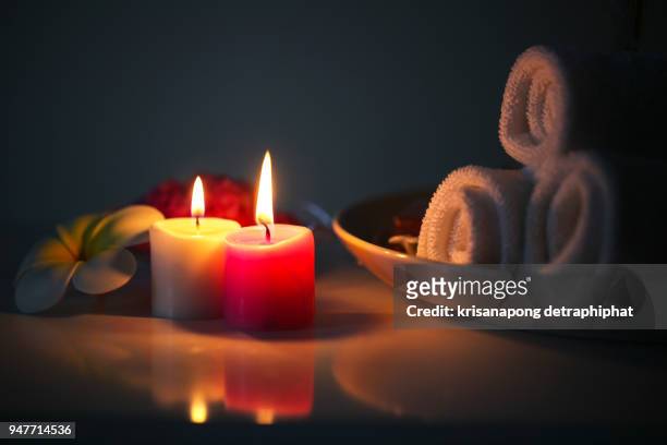 composition of spa treatment on wooden background - scented candle stock pictures, royalty-free photos & images