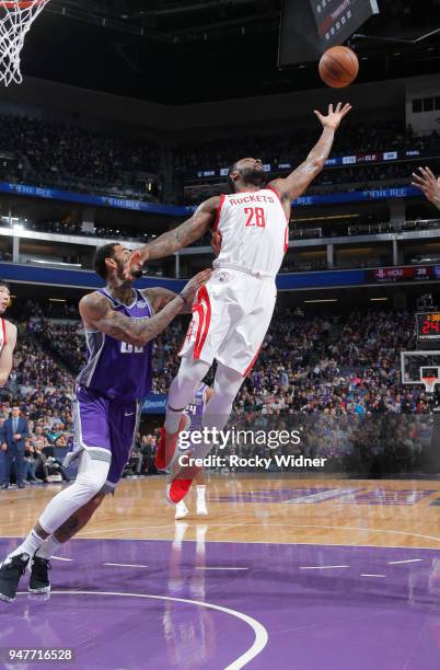 Tarik Black of the Houston Rockets rebounds against Willie Cauley-Stein of the Sacramento Kings on April 11, 2018 at Golden 1 Center in Sacramento,...